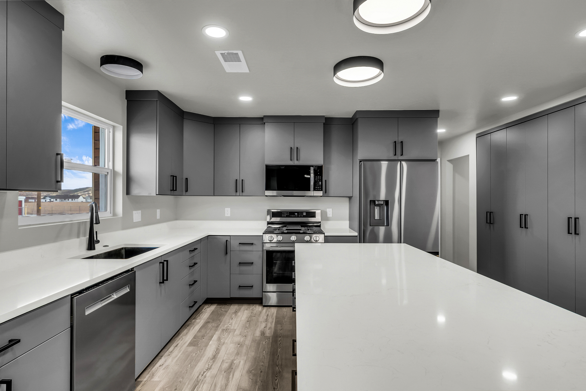 Chef's Kitchen — Custom Cabinets & Quartz Island