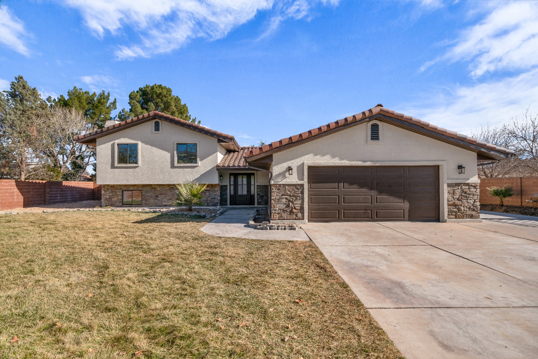 Front Exterior — Stone, Stucco & Tile Roof